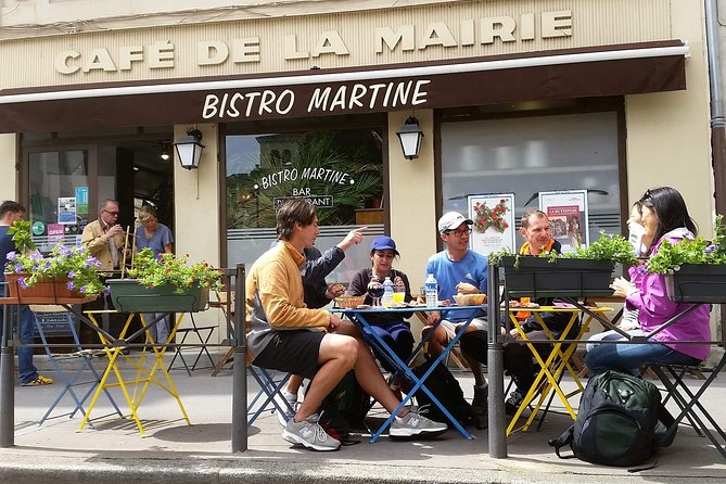 4h Complete Lyon Experience: E-Bike, Food Tasting & Old Town Walk - Lyon’s painted wall and Place des Terreaux