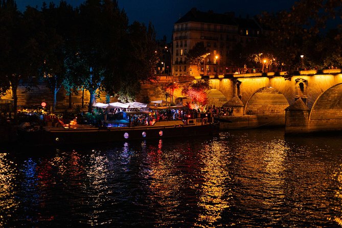 A Magical Evening in Paris With Locals: PRIVATE City Walking Tour - Crossing Champ de Mars toward the Eiffel Tower