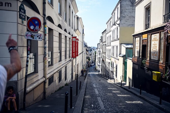 Authentic Parisian Gourmet Food Tour with 10 Local Dishes & Wines - Who should choose Montmartre, and who should choose Notre Dame?