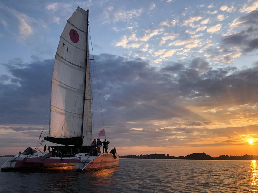 Baden: Gulf of Morbihan Exploration by Catamaran - The lighthouse, open water, and the Houat option