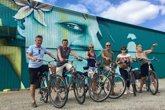 "Bordeaux by bicycle: a 3-hour tour immersive experience" - Churches, courts, and the old city bells