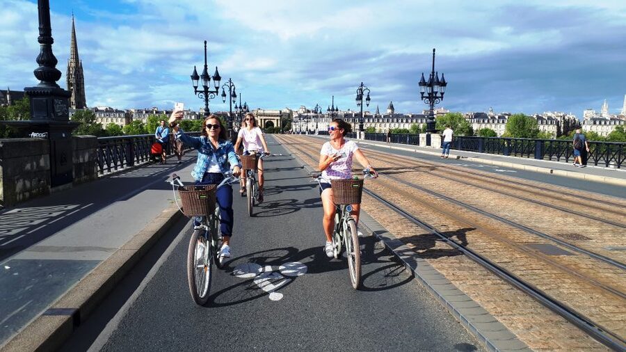 Bordeaux: Top Landmarks & Historic Bike Tour - Quinconces, the Golden Triangle, and the Grand Théâtre
