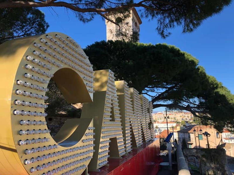 Cannes: City Tour in a Vintage Bus - La Croisette, Palm Beach, and Port Canto