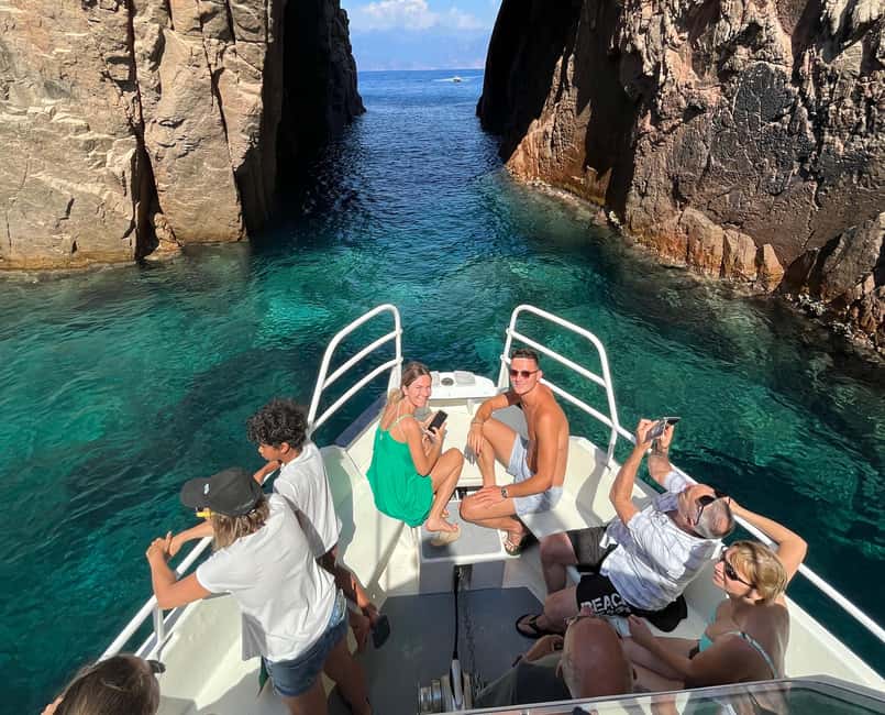 Cargèse: Scandola, Girolata, and Piana Afternoon Boat Tour - Leaving Cargèse beneath the Omigna tower