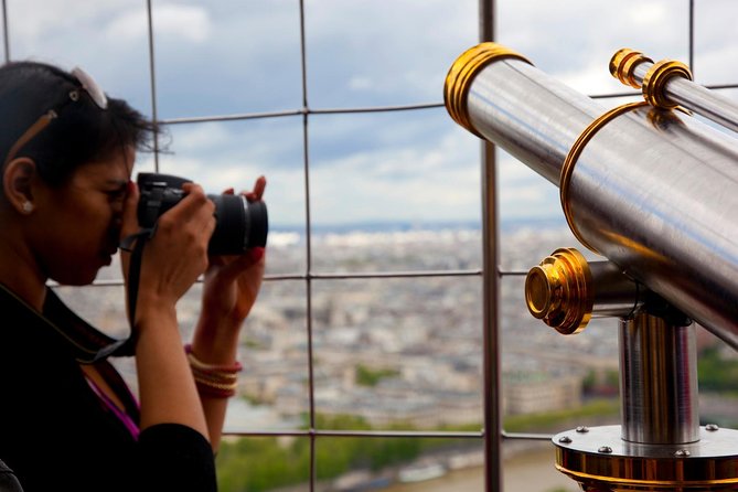 Eiffel Tower Elevator Tour with Optional Summit & Cruise Access - Riding the elevator to the second floor