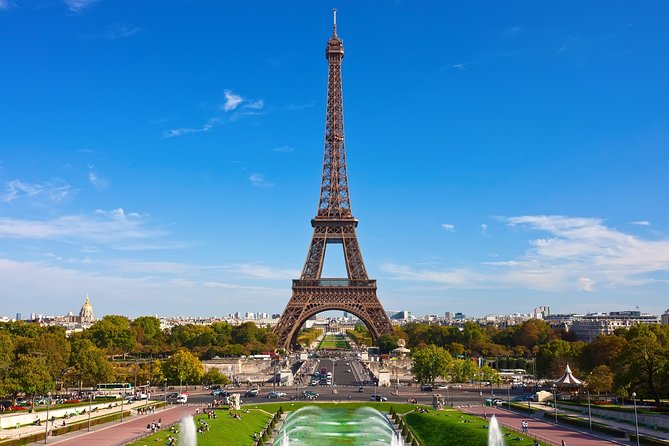 Eiffel Tower Summit Option with Seine River Cruise and City Tour - Going up the Eiffel Tower