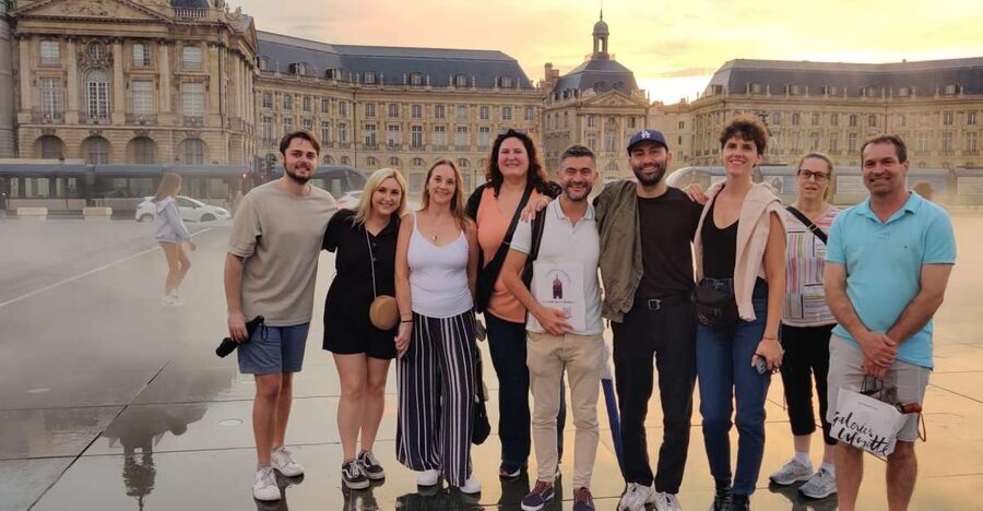 Exclusive! Bordeaux: Nighttime Highlights Walking Tour - Lit squares, medieval gates, and waterside light art