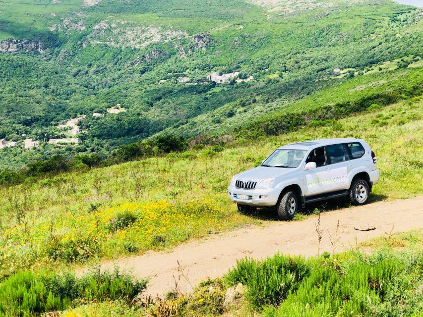 From Calvi: 4x4 Day Tour Mountain & Agriates' Saleccia Beach - Starting with coastal views near Calvi