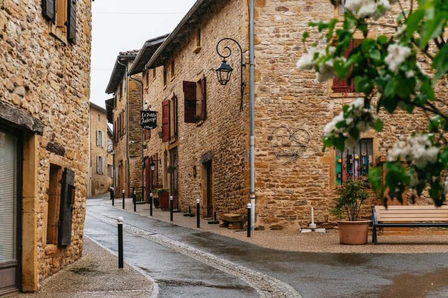 From Lyon: Golden Stones Beaujolais Wine Tasting Tour - The first stop: wine, pastry, and a wide view
