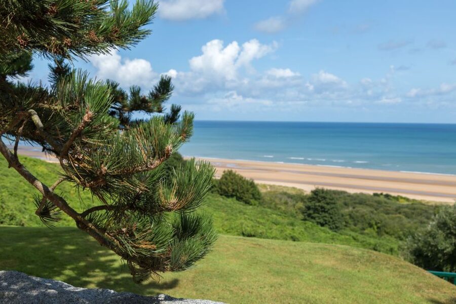 From Paris: 2-Day Normandy & Brittany Tour - Arromanches and the evening in Caen