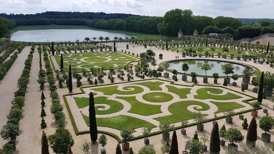 From Paris: Versailles Palace and Gardens Guided Experience - The guided garden route and royal stories