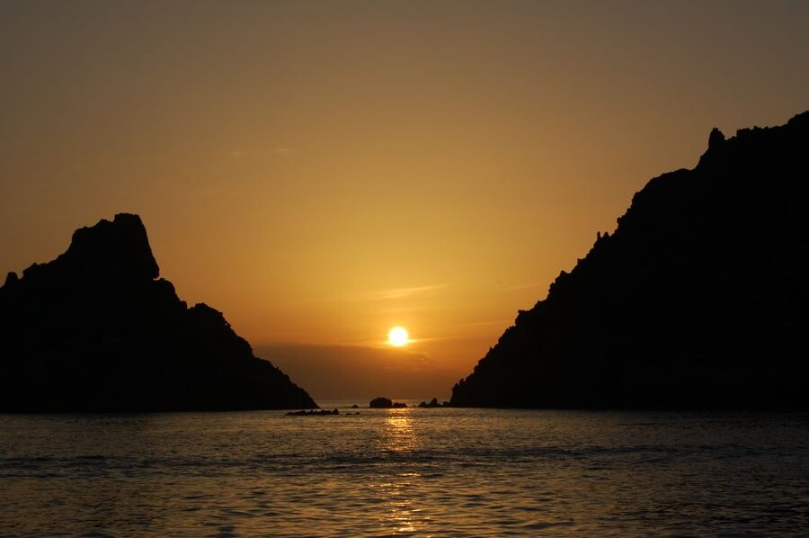 From Porto: Calanche de Piana and Capo Rosso Boat Tour - Commentary, languages, and the value of a small boat