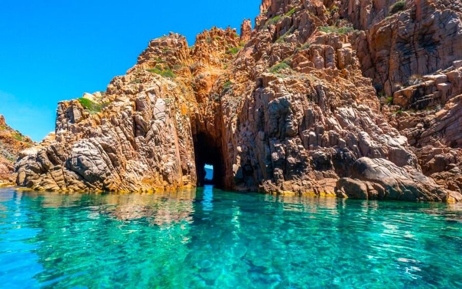 From Porto: Piana Creeks and Scandola Semi-Rigid Boat Tour - A look toward Girolata and the tour’s timing