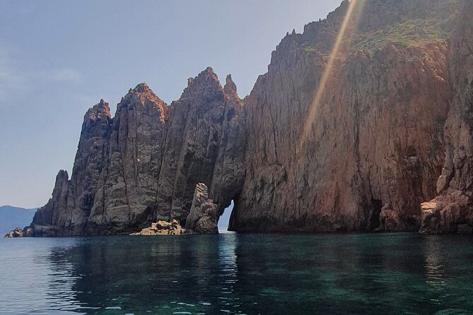 From Sagone/Cargèse: Scandola Calanques Piana Girolata Swimming - Capo Rosso adds a short swim