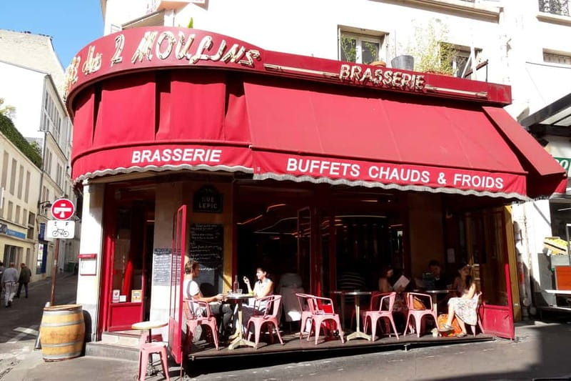 German private Walking Tour through Montmartre & Passages - Montmartre, where artists and cabarets shaped Paris