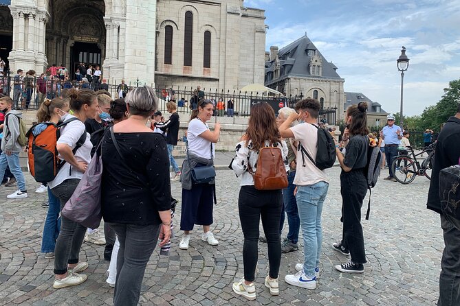 Guided Tour of Sacré-Coeur and Montmartre - From Place Saint-Pierre up the Sacré-Coeur steps