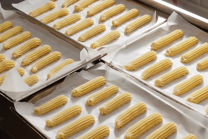 Hands-on Eclair and Choux Making with a Pastry Chef - Filling and glazing the cooled éclairs