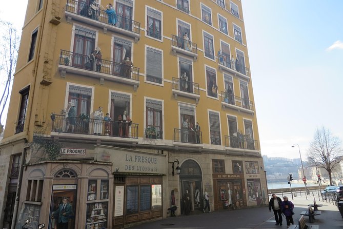 Highlights and Hidden Gems of Lyon Guided Walking Tour (English) - The Fresque des Lyonnais and local identity in paint