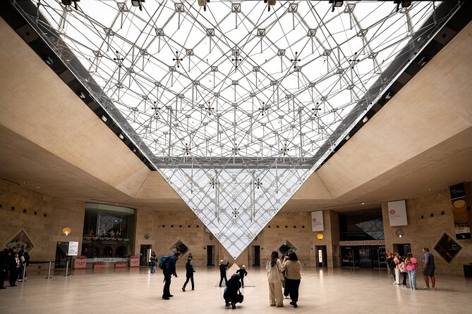 Louvre Masterpieces Express Guided Tour & French Wine Tasting - Leaving the museum for Ô Chateau