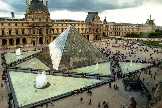 LOUVRE PRIVATE TOUR: Priority Access tickets & Local expert guide - French masterpieces and the grand courtyards