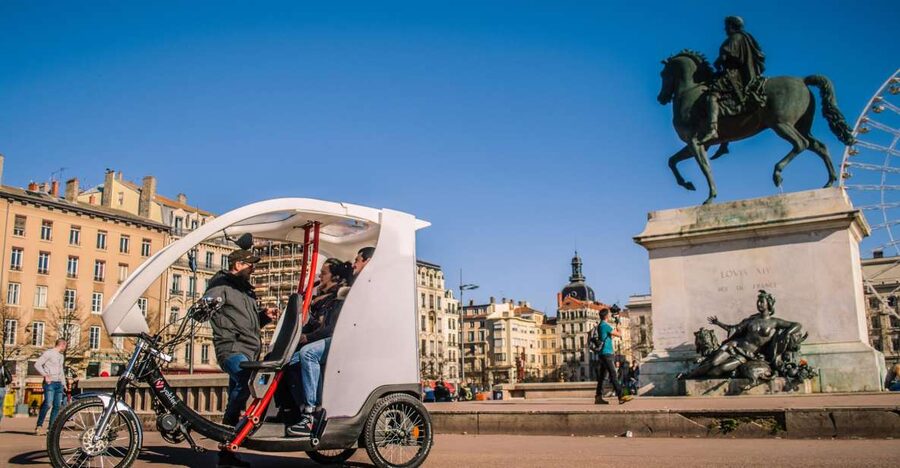 Lyon: Private Pedicab Tour of Top Landmarks & Hidden Gems - Finding Lyon’s traboules and silk-making past