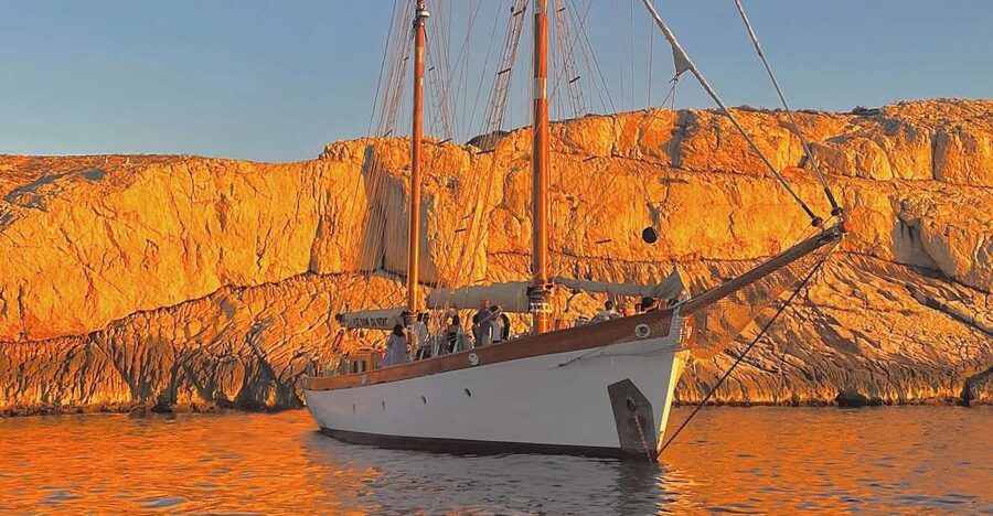 Marseille: Frioul Islands Sunset Cruise with Cocktail Dinner - Leaving Marseille aboard Le Don Du Vent 1947
