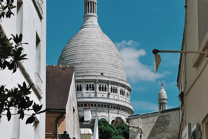 Montmartre District and Sacre Coeur - Exclusive Guided Walking Tour - Place du Tertre and the tourist side of Montmartre