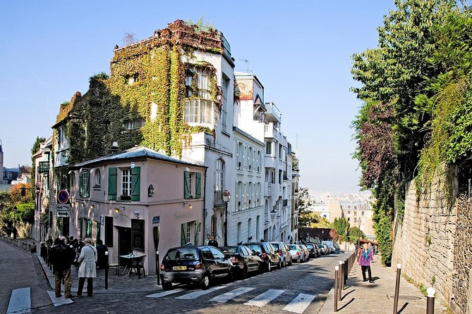 Montmartre Hidden Gems and Scenic Highlights Walking Tour - Moulin de la Galette and Montmartre’s social life