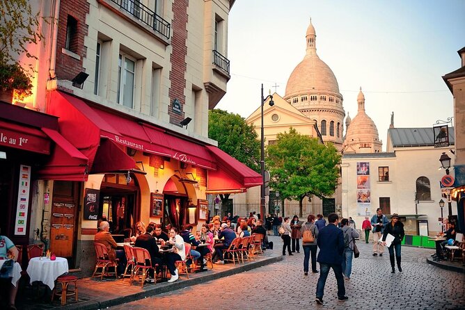 Montmartre Hill French Gourmet Food and Wine Tasting Walking Tour - Starting below Montmartre at the Moulin Rouge