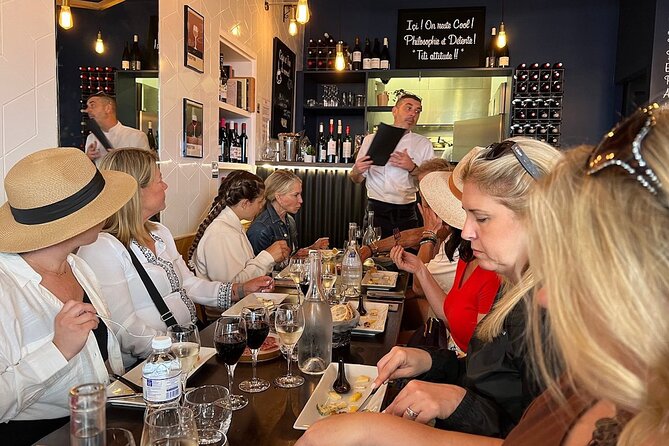 Montmartre Hill French Gourmet Food and Wine Tasting Walking Tour - The wine and cheese pause