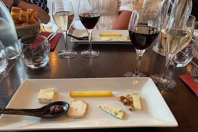 Montmartre Hill French Gourmet Food and Wine Tasting Walking Tour - Winding uphill instead of grinding uphill