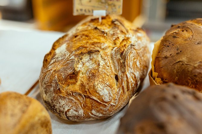Montmartre Private Food Walking Tour With Locals: The 10 Tastings - Starting by the Moulin Rouge
