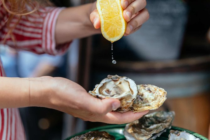 Montmartre Private Food Walking Tour With Locals: The 10 Tastings - Place du Tertre and the busy heart of Montmartre