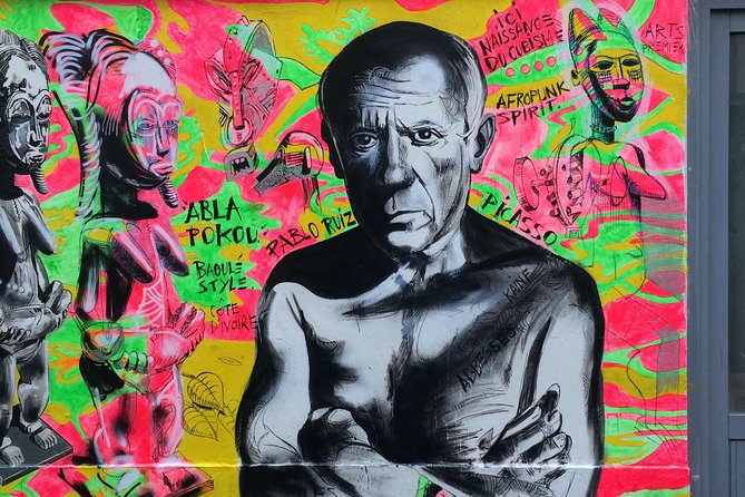 Montmartre Street Art Tour with an Artist - Timing, weather, and cancellation details