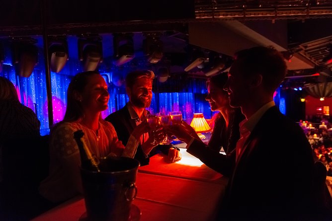 Moulin Rouge Dinner Show with Champagne and Drop Off - Book early, then confirm the fine print