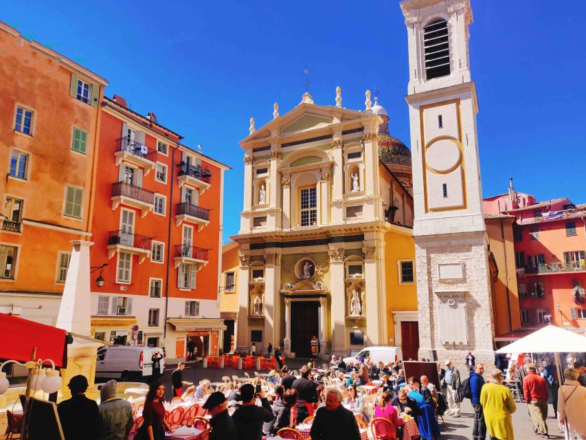 Nice Old Town and Castle Hill: Guided Cultural Walking Tour - Walking toward the Promenade and Old Port