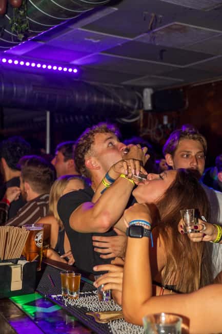 Nice: Party Bar Crawl with Club VIP, 6 Shots, and Games - Games, photos, and the yellow mascot