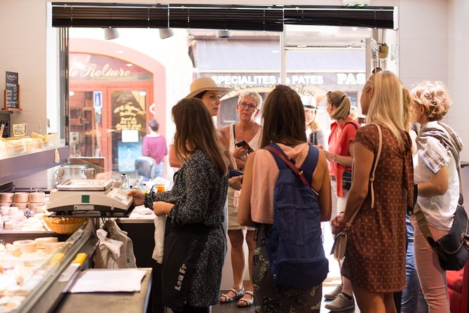 Nice Small-Group Walking Food Tour with Local Specialties & Wine Tasting - Cours Saleya, flowers, stalls, and sweets