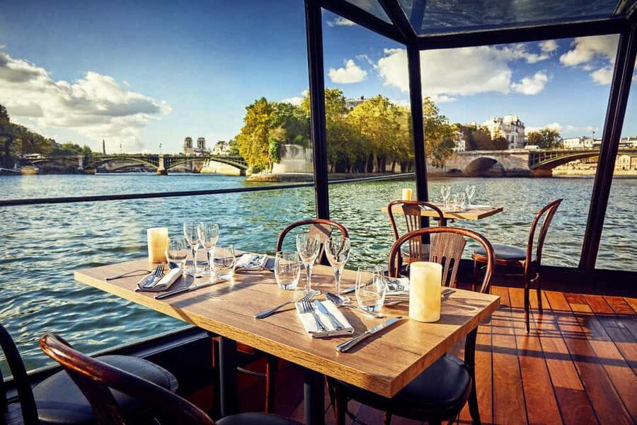 Paris: 3-Course Lunch Cruise on the River Seine - The main course arrives beside central Paris