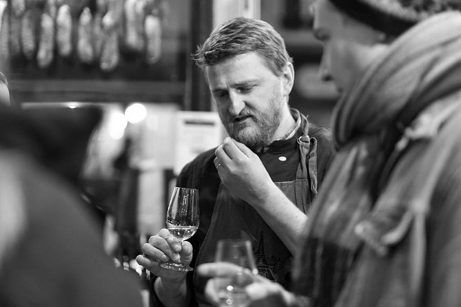 Paris Art of Pairing Cheese and Wine Tasting in a Cheese Cellar - Suited up for the cheese cellar