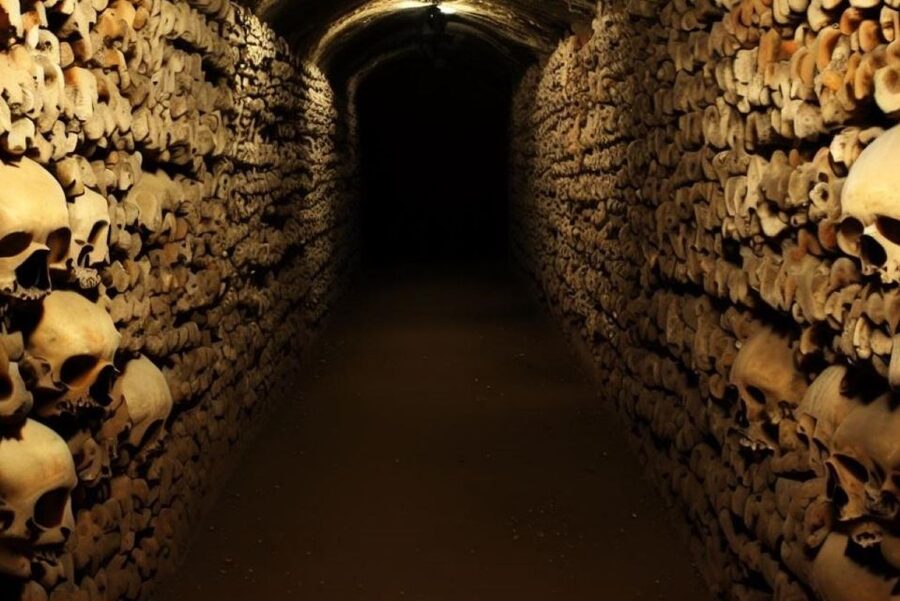 Paris: Catacombs, Audio Guide, and River Cruise Option - The bone-lined galleries and their difficult story