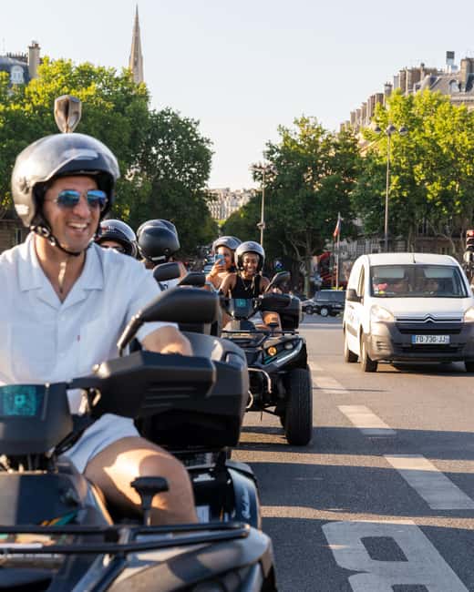 Paris: City Highlights Guided Quad Tour - Eiffel Tower stops are made for photos