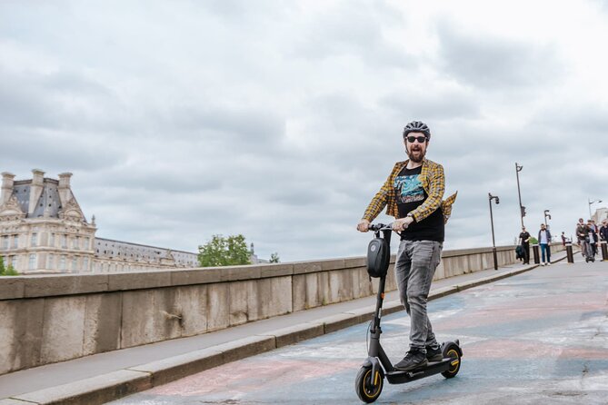 Paris E-Scooter Tour with fun & informative guide (small groups) - Le Marais: A Useful Midway Pause