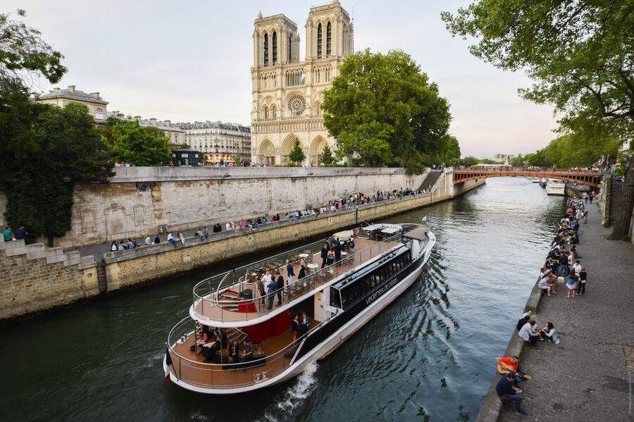 Paris: Eiffel Tower Tour & Seine River Cruise Tour - Reaching the Eiffel Tower second floor