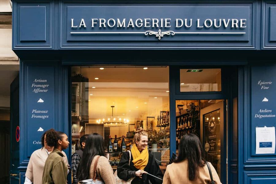 Paris: Gourmet Food Tour with Over 10 Tastings and Wine - Paris markets, old shops, and a sweet finish