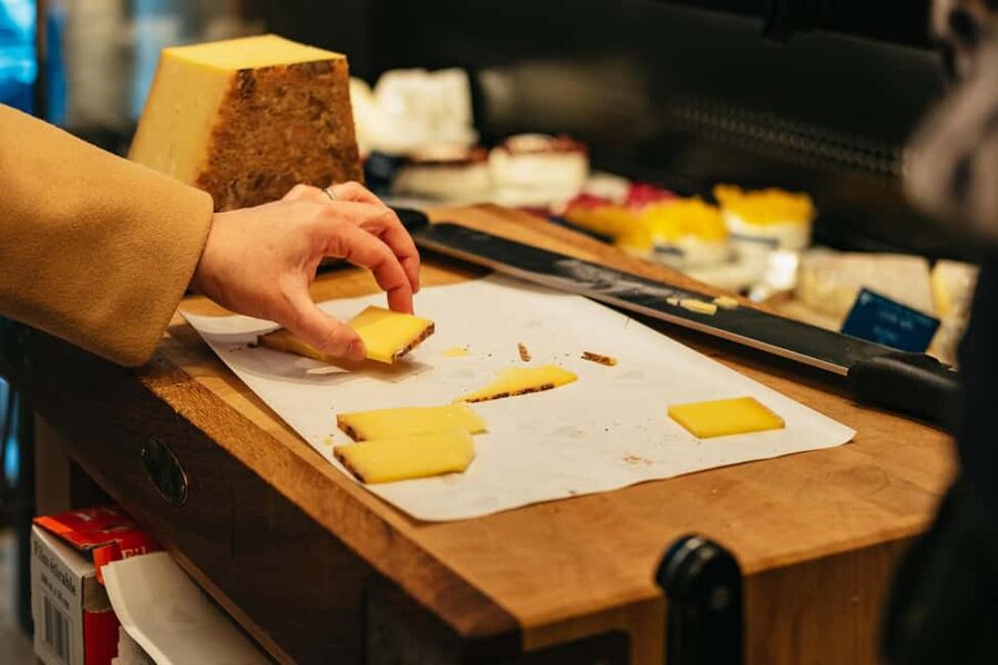 Paris: Gourmet Food Tour with Over 10 Tastings and Wine - What the guides add to the food