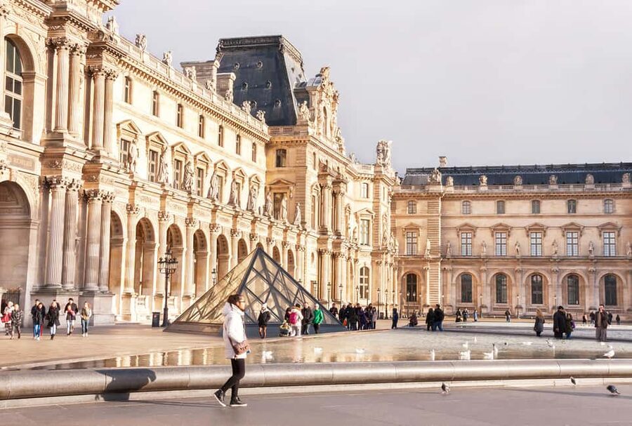 Paris: Louvre Museum Entry Ticket and Garden Walking Tour - Passing beneath the Arc de Triomphe du Carrousel