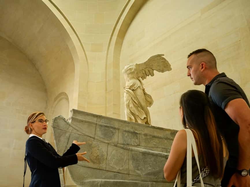 Paris: Louvre Museum Guided Tour with Skip-the-Ticket-Line - Looking up at Winged Victory of Samothrace