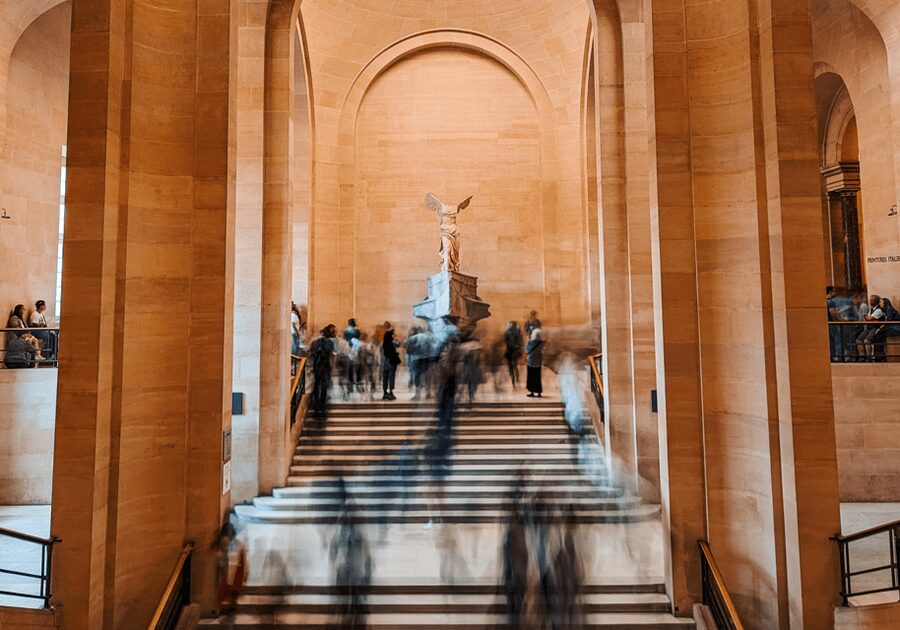 Paris: Louvre Museum Ticket & Exclusive Immersive AudioGuide - The Pyramid entrance and ticketed queue