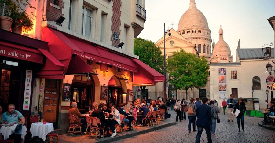 Paris: Montmartre Food Tour with Full Meal - Place des Abbesses and the sweet side of Paris